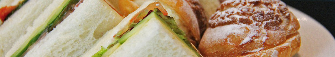 Eating Sandwich at Baldinos Giant Jersey Subs restaurant in Doraville, GA.